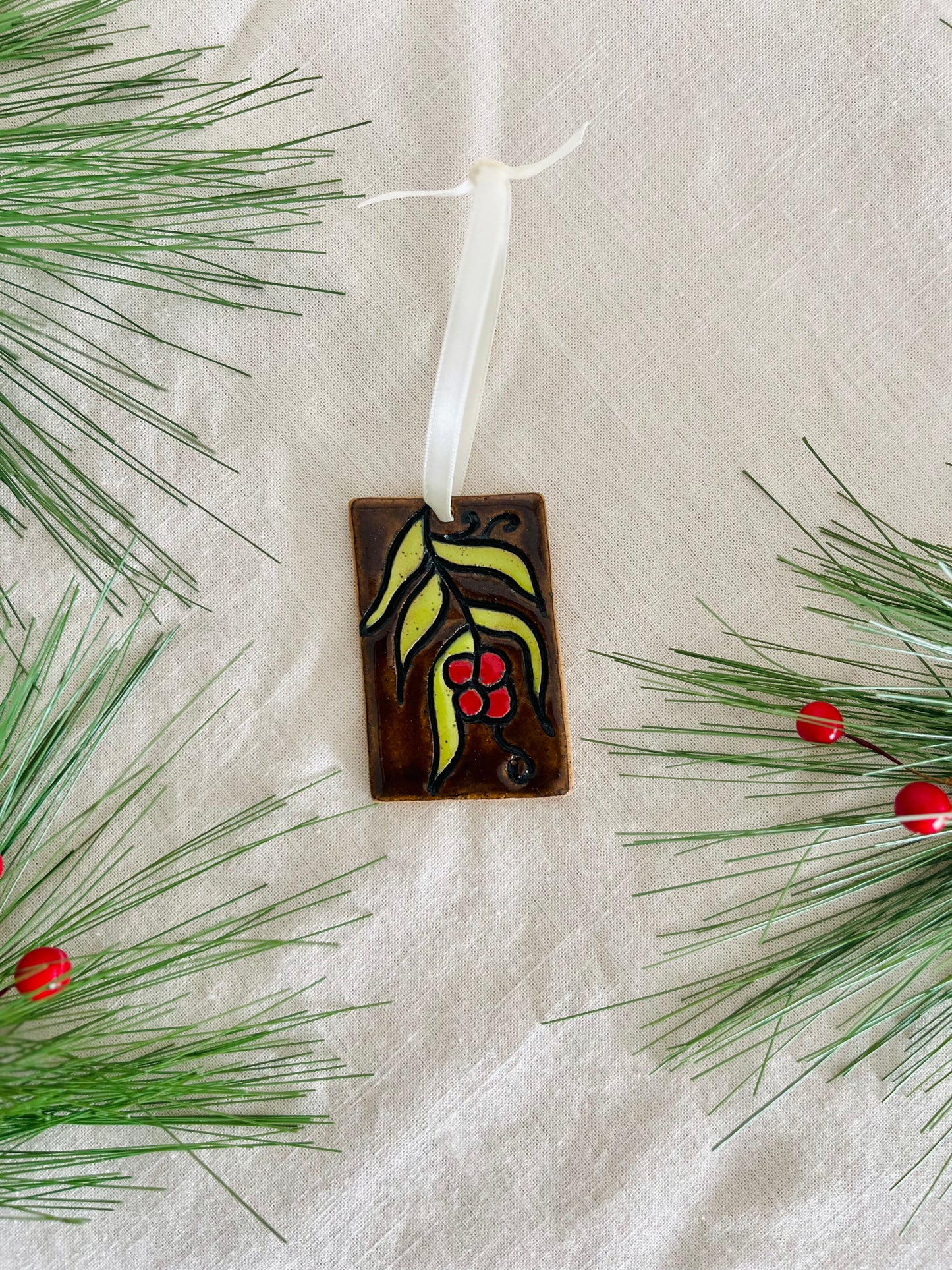 Ornament: stained glass holly