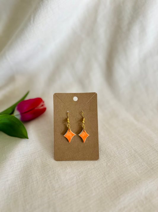 Earrings: orange diamond (dangle)